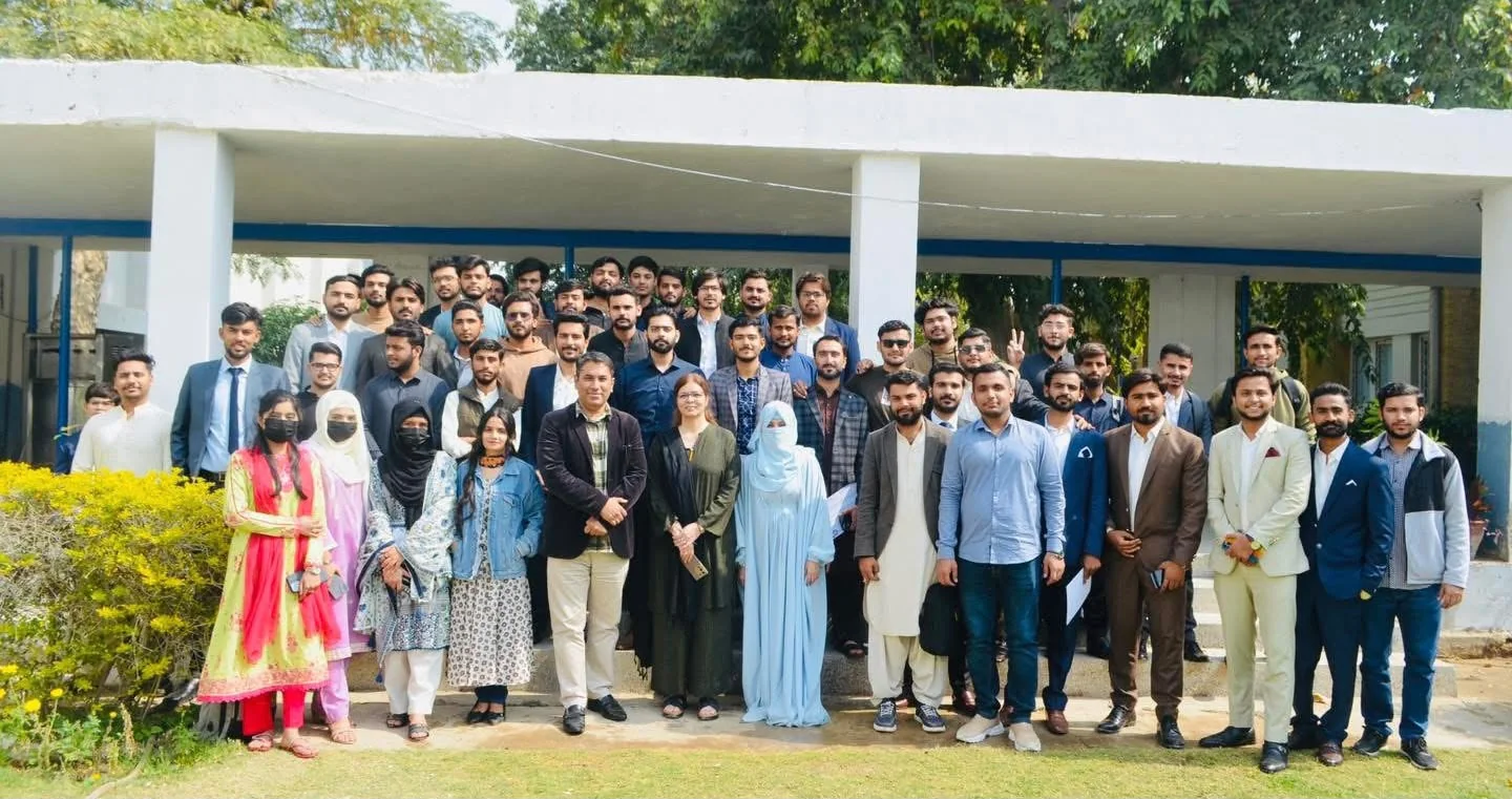 Students attending an event in a university auditorium